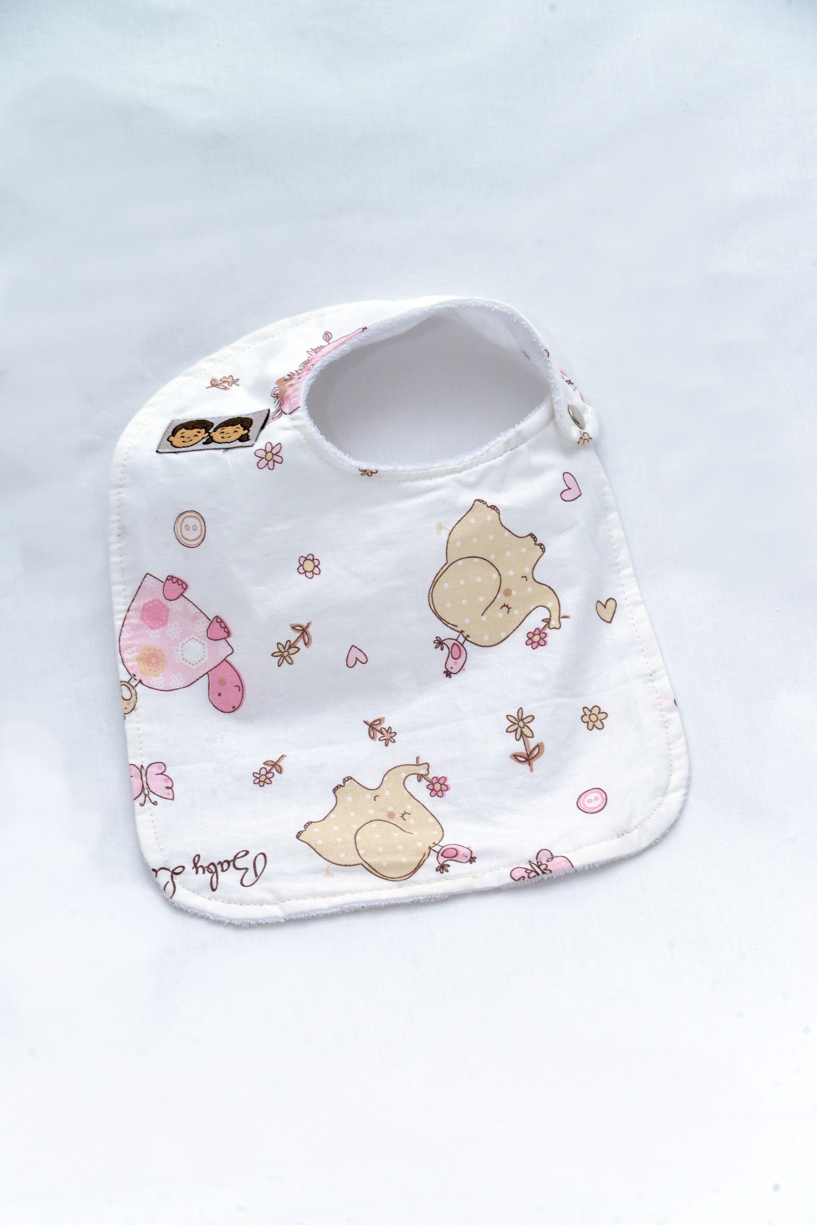 Bavoir Elephant Rose
