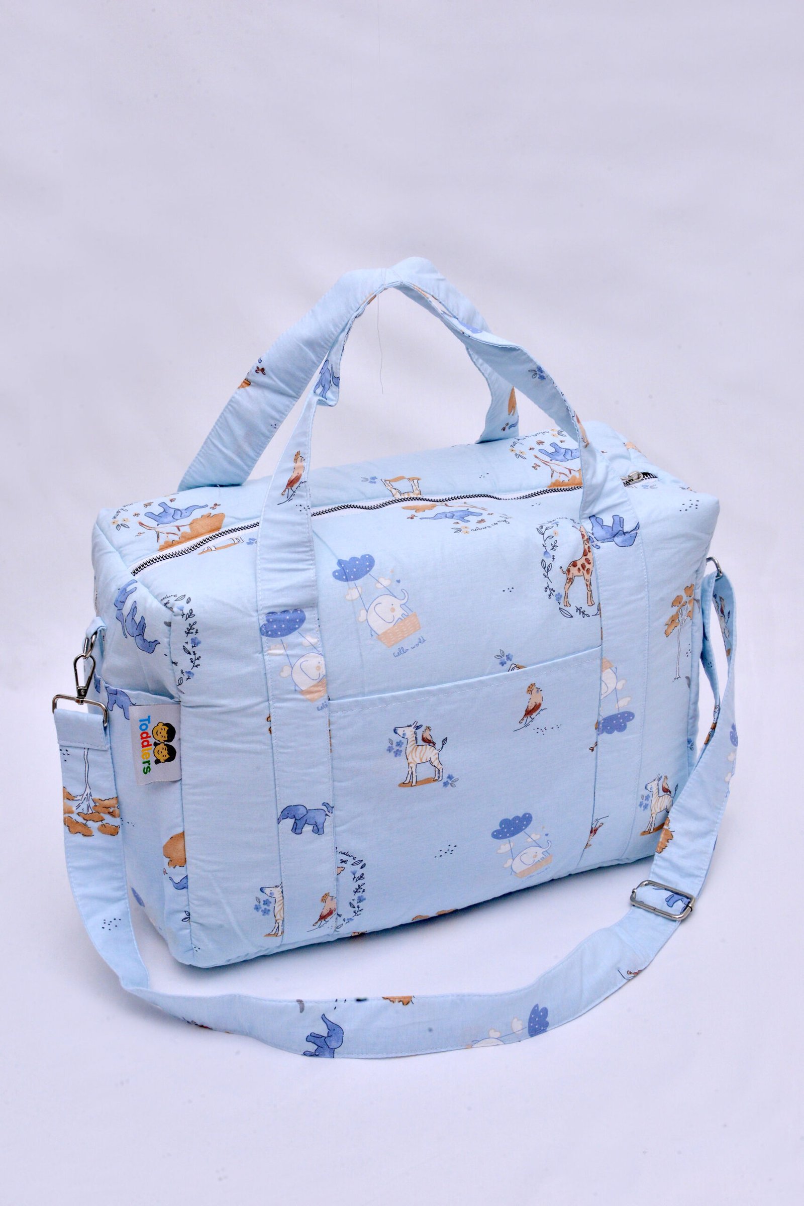 sac a langer giraffe bleu